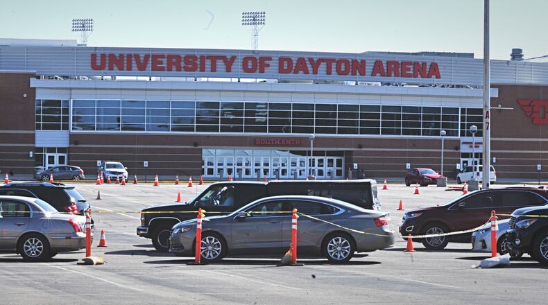 Cars are lined up for the first day of antibody testing available at the University of Dayton Arena test collection site in conjunction with Premier Health and CompuNet Labs Monday, April 4, 2020. MARSHALL GORBY / STAFF