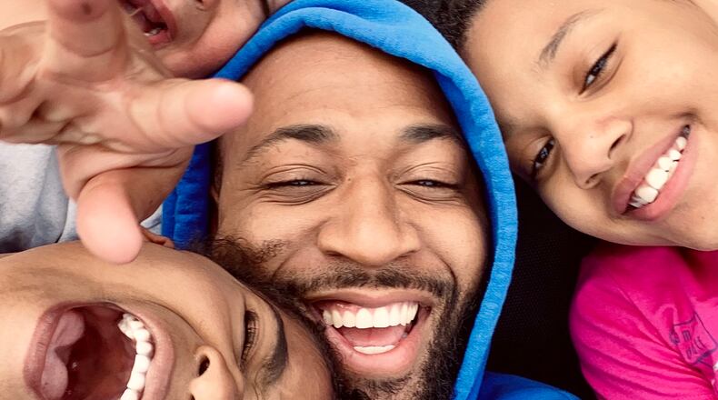 Brad Cubbie, center, with his kids, Khole Burns, Braleigh Cubbie and Kane Cubbie. Courtesy Brad Cubbie.