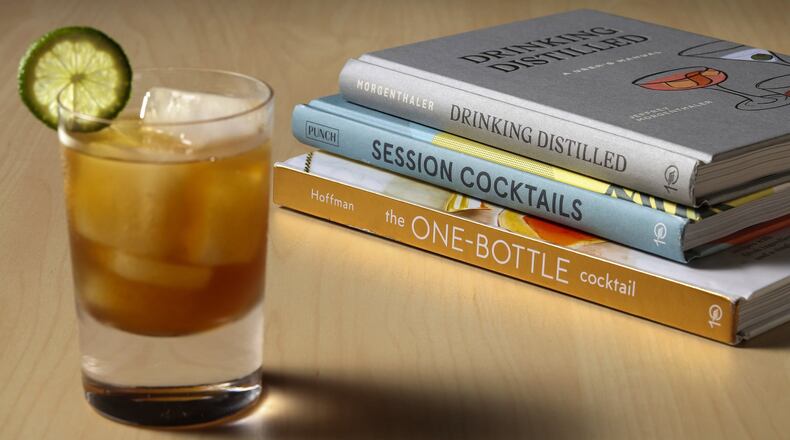 Let these new books, “Drinking Distilled,” from top, “Session Cocktails” and “The One Bottle Cocktail,” guide your summer sipping. Start with a quaffable session margarita, pictured, from “Session Cocktails.” Styled by Shannon Kinsella. (Abel Uribe/Chicago Tribune/TNS)
