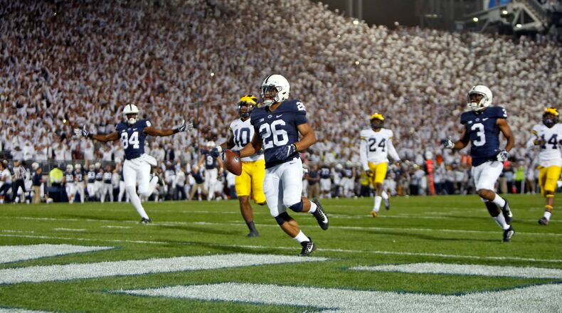 STATE COLLEGE, PA - OCTOBER 21: Saquon Barkley #26 of the Penn State Nittany Lions rushes for a 69 yard touchdown in the first half against the Michigan Wolverines on October 21, 2017 at Beaver Stadium in State College, Pennsylvania. (Photo by Justin K. Aller/Getty Images)