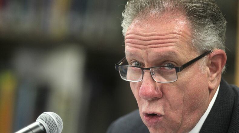 Fairborn School Board President Gene Lolli addresses the crowd at the meeting Thursday June 4, 2020. JIM NOELKER/STAFF