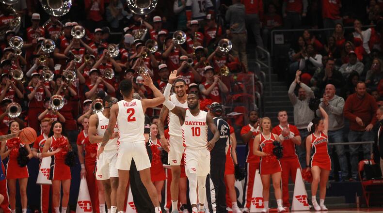 Dayton's Jalen Crutcher celebrates after making a last-second shot in the first half against Indiana State on Saturday, Nov. 9, 2019, at UD Arena.
