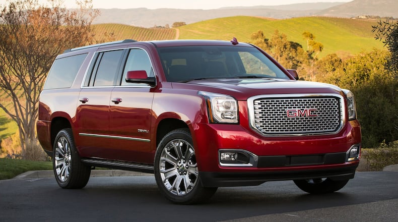 The 2017 GMC Yukon Denali models are available in 2WD and 4WD configurations. The XL Denali has a wheelbase that is 14 inches longer (20 inches overall) than the Yukon Denali, with more than twice the cargo room behind the third-row seat. GMC photo