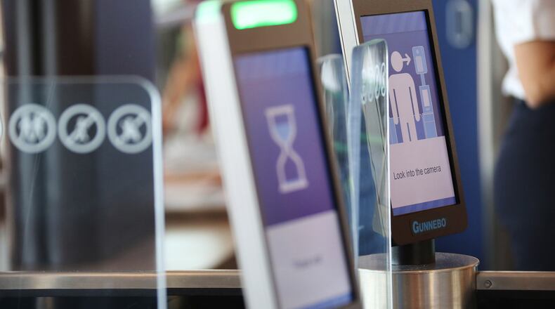 A biometric facial recognition screening machine in a British Airways international gate on Tuesday, April 24, 2018 at the Orlando International Airport. (Ricardo Ramirez Buxeda/Orlando Sentinel/TNS)