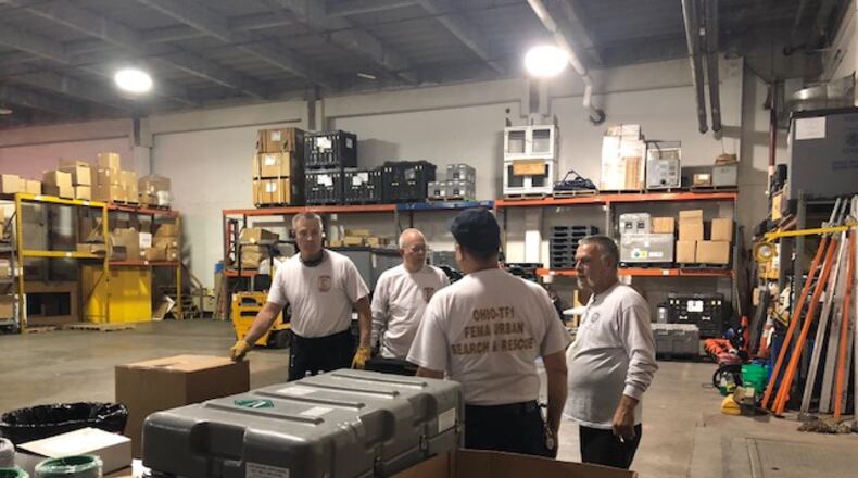 Members of an Ohio Task Force 1 team prepared to depart from their Kettering Business Park headquarters to North Carolina to assist with Hurricane Florence in this September 2018 photo. GABRIELLE ENRIGHT/STAFF