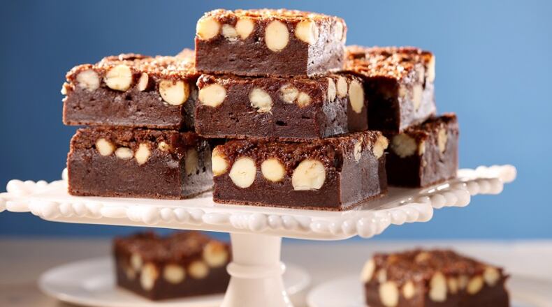 To update the Palmer House brownie, Pastry chef Alison Cates used bittersweet chocolate in the base and added salt to enhance that flavor. She changed the topping completely, going with a fig chutney glaze over toasted macadamia nuts. You can keep them whole or lightly crush them. Foodstyling by Mark Graham. (Michael Tercha/Chicago Tribune/TNS)