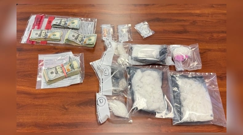 Butler County Undercover Regional Narcotics Task Force officers found and confiscated on Thursday, Nov. 6, 2025, 4 pounds of methamphetamine, 1.6 grams of fentanyl, 70 pressed pills and $10,000 (pictured). Officers arrested Obryan Chapman, 40, and Dominick Brown, 38, on drug-related felonies. Additional charges are pending as the case remains under investigation. CONTRIBUTED