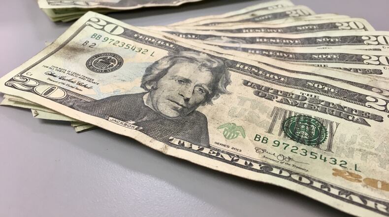 The United States Secret Service seized several fake $20 bills they said were used by Kenneth Stopkotte during Wednesday night’s Dayton Dragons baseball game. MARK GOKAVI/Staff