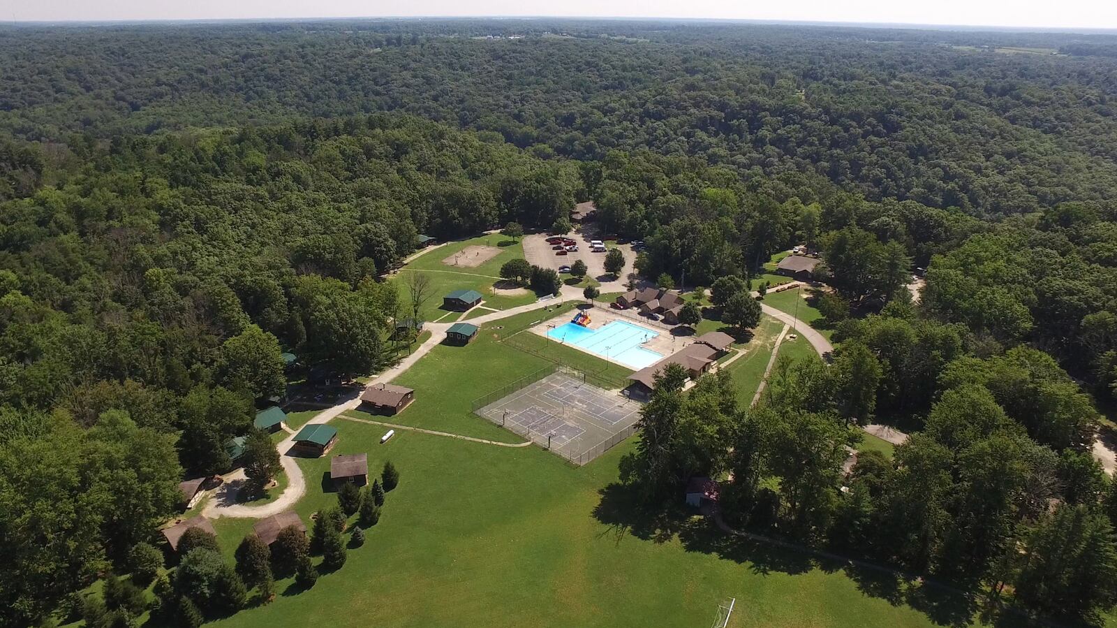 Surrounded by a mature hardwood forest, the nearly 500-acre Greater Dayton YMCA Camp Kern sits atop a ridge above the Little Miami River in Warren County.   TY GREENLEES / STAFF