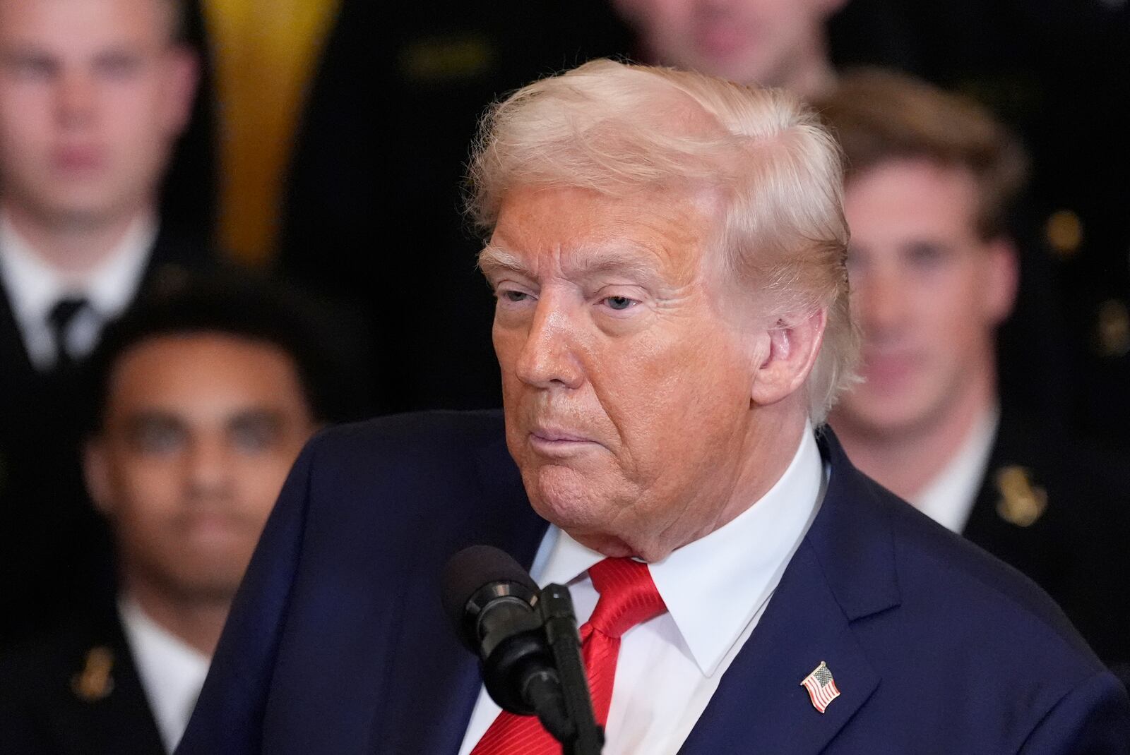 President Donald Trump speaks during the Commander-in-Chief trophy presentation to the Navy Midshipman football team in the East Room of the White House, Tuesday, April 15, 2025, in Washington. (AP Photo/Alex Brandon)