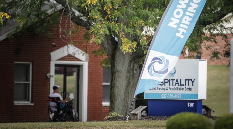 Hospitality Skilled Nursing & Rehabilitation Center located near Greene Memorial Hospital flies a now hiring flag in front of the facility.Jim Noelker/Staff