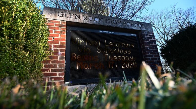 GLEN ROCK, NJ - MARCH 15: A sign displays the message that Glen Rock High School will transition to virtual learning starting Tuesday, March 17 as the coronavirus continues to spread across the United States on March 15, 2020 in Glen Rock, New Jersey. The World Health Organization declared the coronavirus (COVID-19) a global pandemic on March 11th.