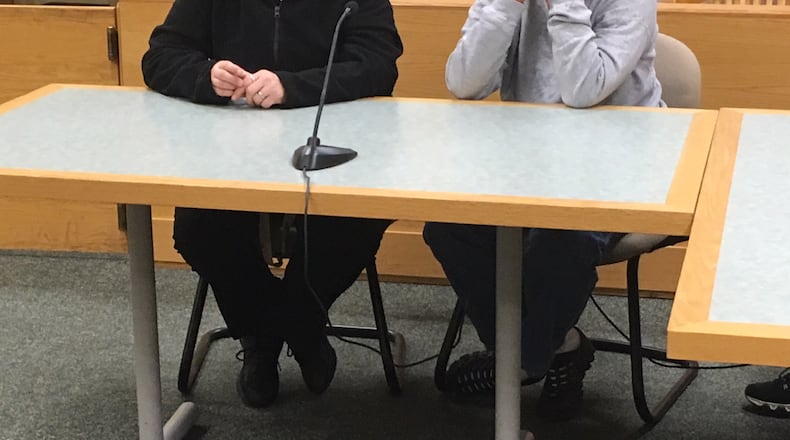 An 11-year-old Baker Middle School student, right, and her mother sit Friday in Greene County Juvenile Court. Because none are charged as adults, the Daily News is not identifying the juveniles arrested Thursday. CHUCK HAMLIN / STAFF