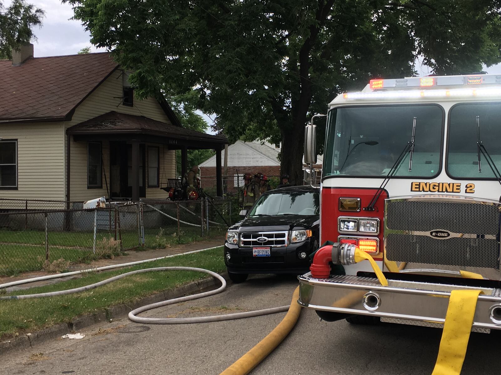 Dayton fire crews are investigating a house fire Tuesday morning on Hunter Avenue. (Jarod Thrush/Staff)