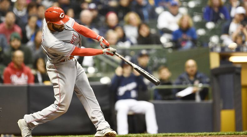 MILWAUKEE, WI - APRIL 16: Jose Peraza #9 of the Cincinnati Reds hits a two run double against the Milwaukee Brewers during the sixth inning at Miller Park on April 16, 2018 in Milwaukee, Wisconsin. (Photo by Stacy Revere/Getty Images)