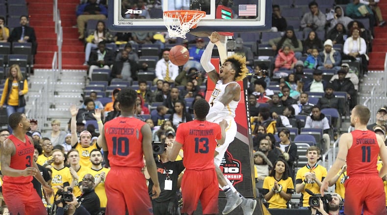 Virginia Commonwealth’s Justin Tillman dunks against Dayton on March 8, 2018, at Capital One Arena in Washington, D.C. David Jablonski/Staff