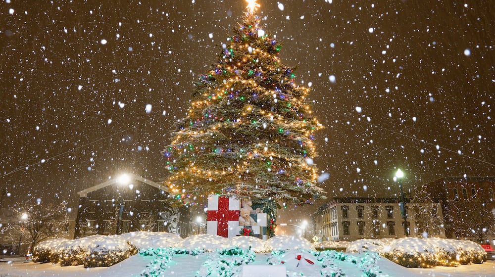 A snow storm moved through the region on Monday, Dec. 1 and blanketed area Christmas tree displays, including Troy. Miami County is expected to see between three and five inches; all of the area is expected to see at least two inches. BRYANT BILLING/STAFF