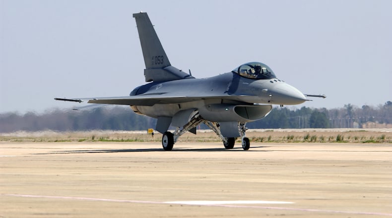 Brig. Gen. Jeff Riemer delivers the last new Air Force F-16 Fighting Falcon here March 18 at Shaw Air Force Base in March 2005. While Lockheed continued to produce F-16s for international coalition partners, this aircraft was the last of 2,231 F-16s produced for the Air Force. (U.S. Air Force photo by Staff Sgt. Josef E. Cole III)