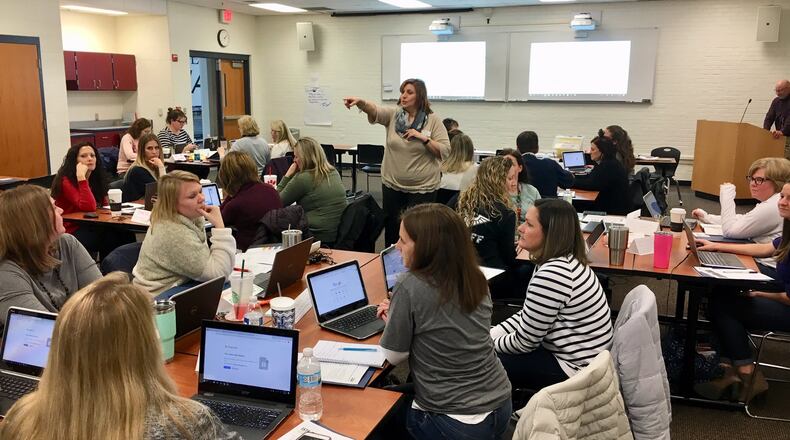 Butler County Educational Services Center (BCESC) Curriculum Georgine Bowman teaches Lakota School instructors who came back from their holiday break early to learn new techniques and skills on digital learning. The class was held Wednesday at Lakota East High School in Liberty Township and the professional development program will continue for six months.
