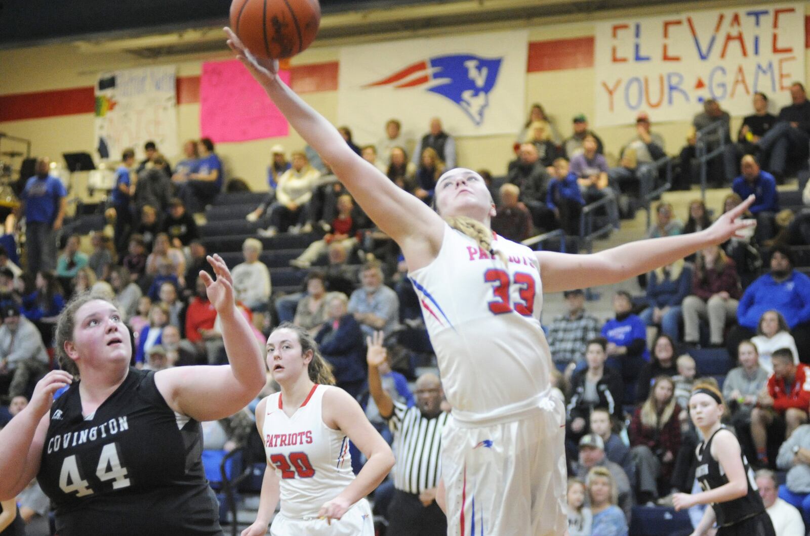 Maddie Downing of Tri-Village snaps a rebound away from Covington’s Lauren Christian. Tri-Village defeated visiting Covington 44-35 in a girls high school basketball game on Thursday, Jan. 10, 2019. MARC PENDLETON / STAFF