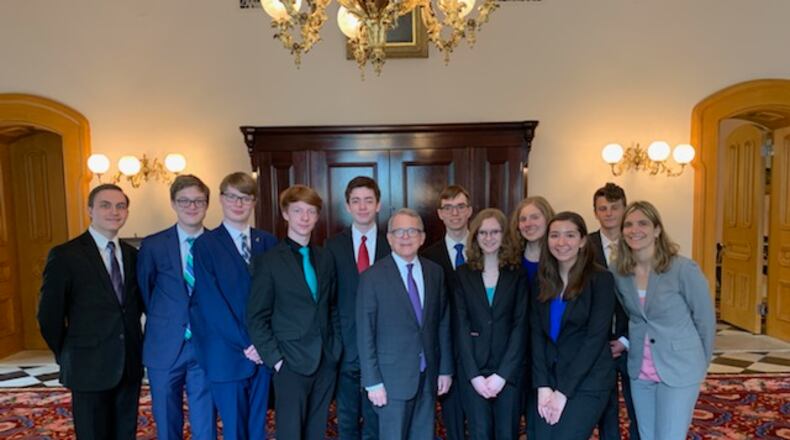 Oakwood High School Academic Decathlon team with Ohio Gov. Mike DeWine