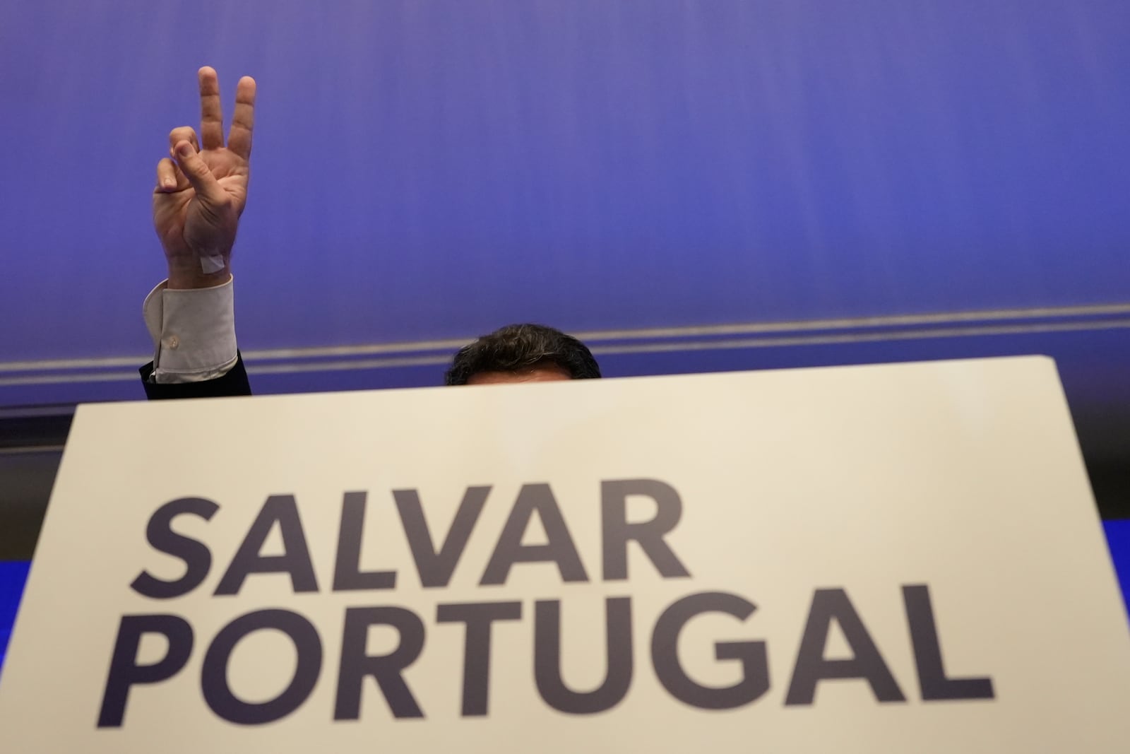 "The hard-right populist party Chega" leader Andre Ventura gestures while addressing media and his supporters, following Portugal's general election, in Lisbon, Monday, May 19, 2025. (AP Photo/Ana Brigida)
