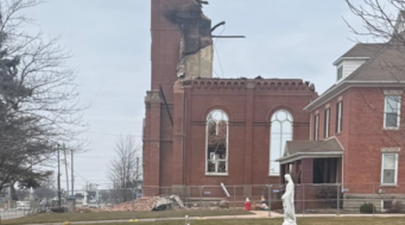 Demolition began on Jan. 7, 2026, at St. John the Baptist Church's bell tower in Maria Stein. The church was previously damaged in a fire last year, and on Dec. 29, 2025, the west wall collapsed during strong winds. Photo courtesy the Archdiocese of Cincinnati.