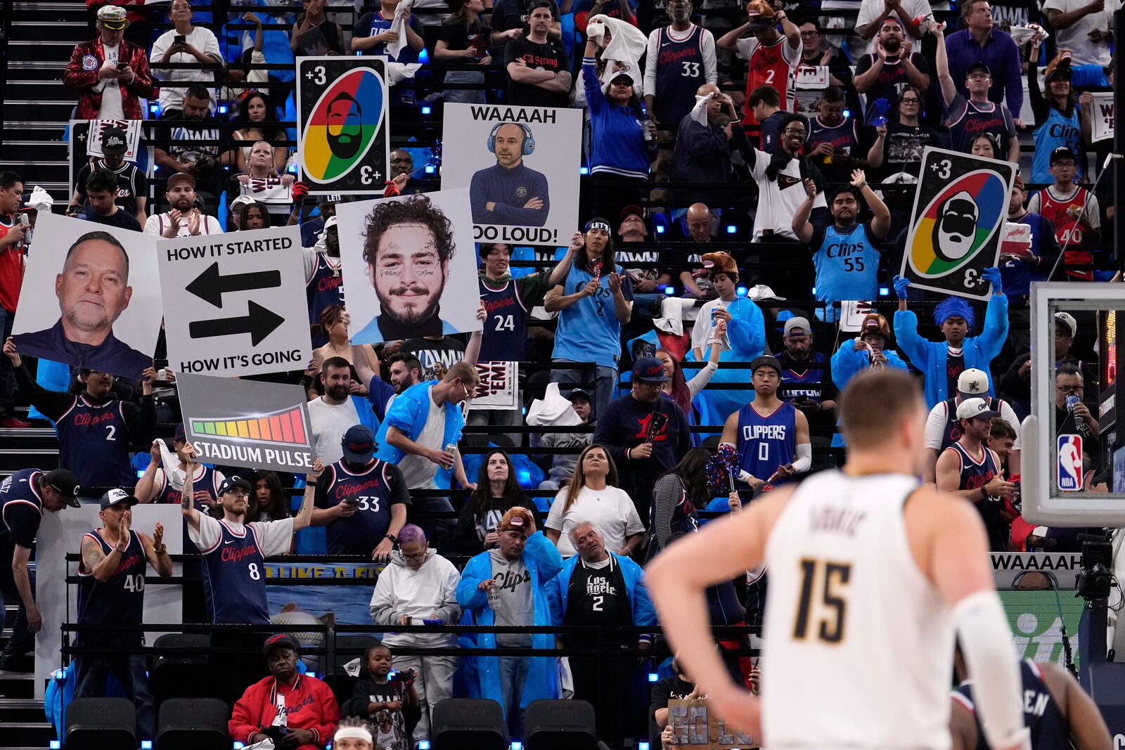 Fans taunt the Denver Nuggets from "The Wall" during the second half in Game 3 of an NBA basketball first-round playoff series against the Los Angeles Clippers Thursday, April 24, 2025, in Inglewood, Calif. (AP Photo/Mark J. Terrill)