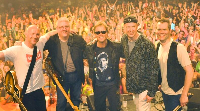 Stranger, (left to right) Matt Smith, Bruce Crobolotti, Jeff Stevens, Brian Elias and Rob Hoeting, celebrates its 20th year playing ’80s cover songs, at Austin Landing in Springboro on Friday, June 3. CONTRIBUTED