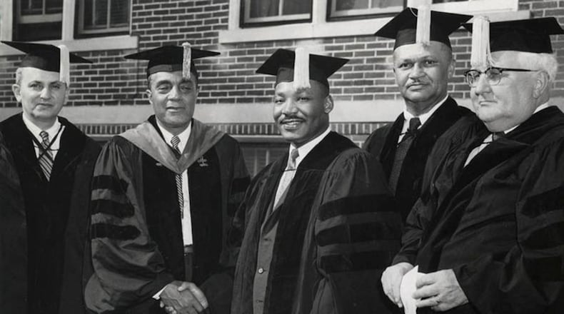 Dr. Martin Luther King, Jr. (center) received an honorary degree from Central State University in 1958. DAYTON DAILY NEWS ARCHIVES