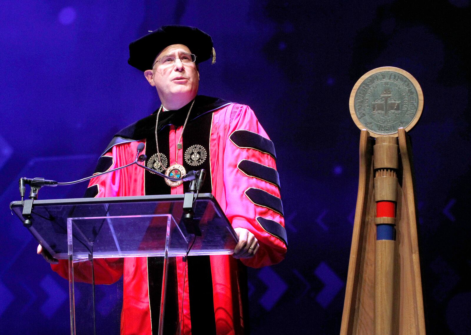 The installation of Eric F. Spina, as the 19th president of the University of Dayton, was held at UD Arena Tuesday. Spina, who became UD's president July 1, 2016, succeeds Daniel J. Curran.   LISA POWELL / STAFF