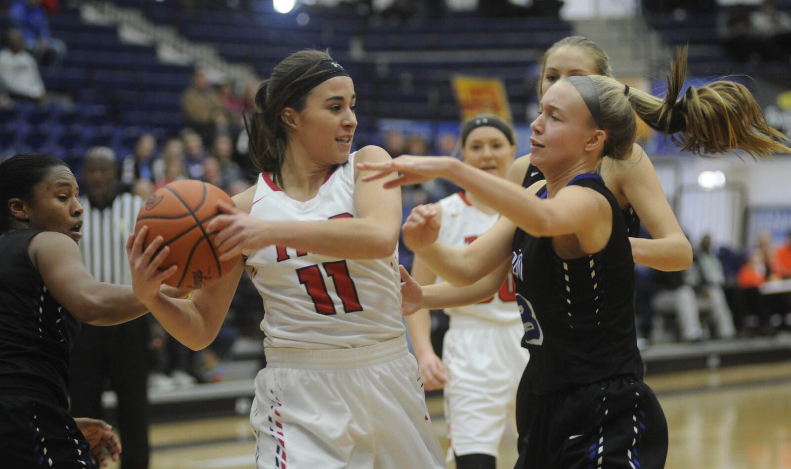 Tipp’s Hailee Varvel (with ball) is confronted by Springboro’s Macy Tischler. Tippecanoe and Springboro played in Saturday’s opener of the 16th Annual Premier Health Flyin to the Hoop at Fairmont s Trent Arena on Jan. 13, 2018. MARC PENDLETON / STAFF