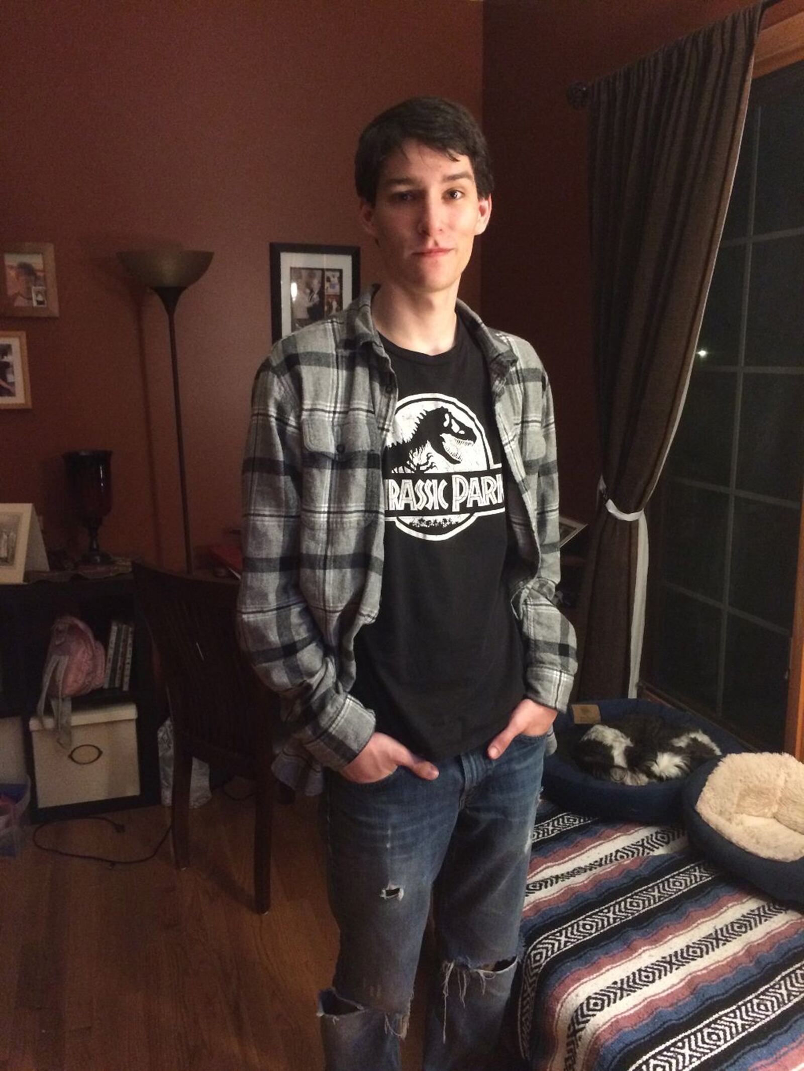 Zachary Dundek has worn a shirt featuring dinosaurs for 5,000 consecutive days. He said he plans to keep the streak alive as he heads off to college this fall. (Dundek family photo)