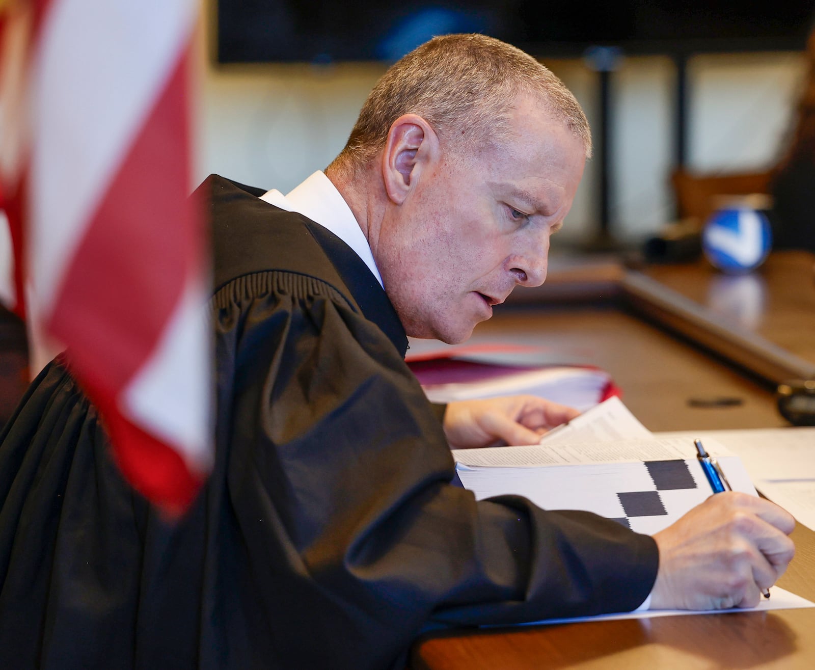 Clark County Common Pleas Judge Douglas Rastatter takes notes during opening arguments in a murder trial for William Brock. The 83-year-old is accused of fatally shooting Lo-Letha “Letha” Toland-Hall, a 61-year-old Uber driver in March 2024 because he reportedly believed she was trying to rob him after scammers deceived them. JOSEPH COOKE/STAFF