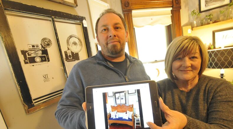 Bryan and Lori Lucas, owners of This Old Couch, in Beavercreek, have Photograph all the items in their store so that people do not have to come out to look, but can stay home and shop In safety. MARSHALL GORBYSTAFF