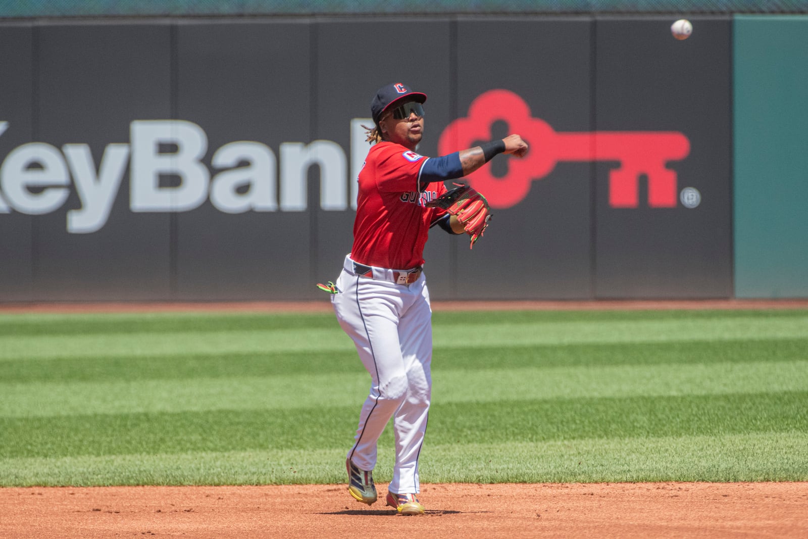 Cleveland Guardians' Jose Ramirez throws St. Louis Cardinals' Thomas Saggese out at first base during the first inning of a baseball game, Sunday, June 29, 2025, in Cleveland. (AP Photo/Phil Long)