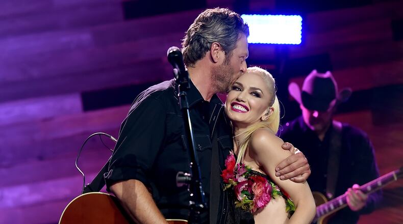 BURBANK, CA - MAY 09: Singers Blake Shelton (L) and Gwen Stefani perform on the Honda Stage at the iHeartRadio Theater on May 9, 2016 in Burbank, California. (Photo by Kevin Winter/Getty Images for iHeartMedia)