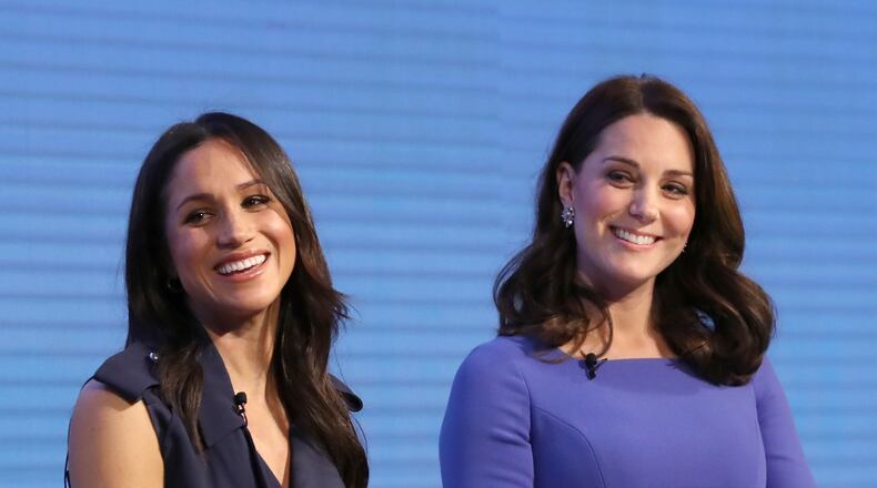Meghan Markle, left, and Catherine, Duchess of Cambridge, attend the first Royal Foundation Forum on February 28, 2018, in London. (Rota/i-Images/Zuma Press/TNS)