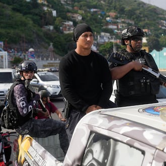 Police patrol in La Guaira, Venezuela, Saturday, Jan. 3, 2026, after U.S. President Donald Trump announced that President Nicolás Maduro had been captured and flown out of the country. (AP Photo/Matias Delacroix)