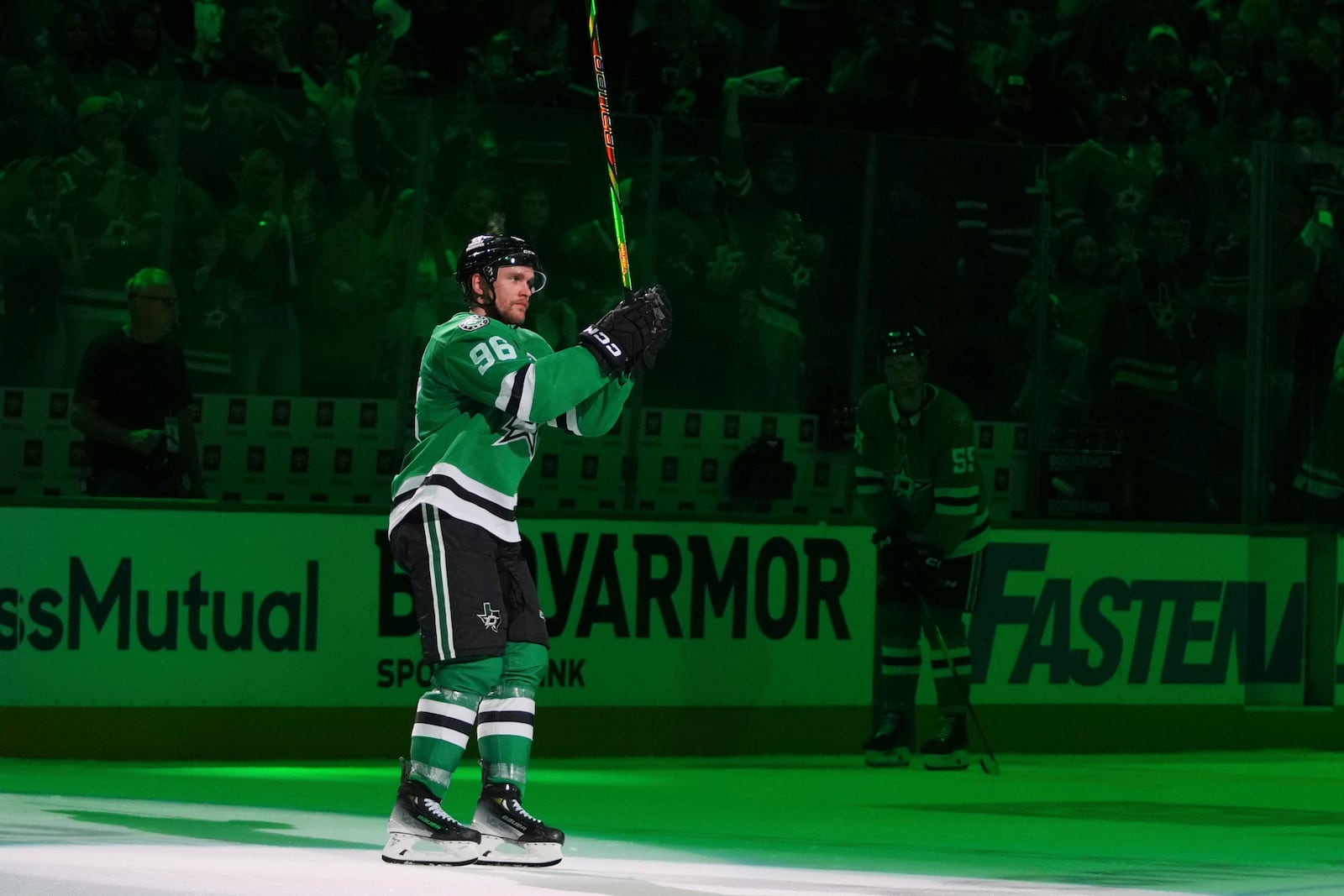 Dallas Stars right wing Mikko Rantanen acknowleges cheers from fans after Game 3 of a second-round NHL hockey playoff series against the Winnipeg Jets in Dallas, Sunday, May 11, 2025. (AP Photo/Julio Cortez)