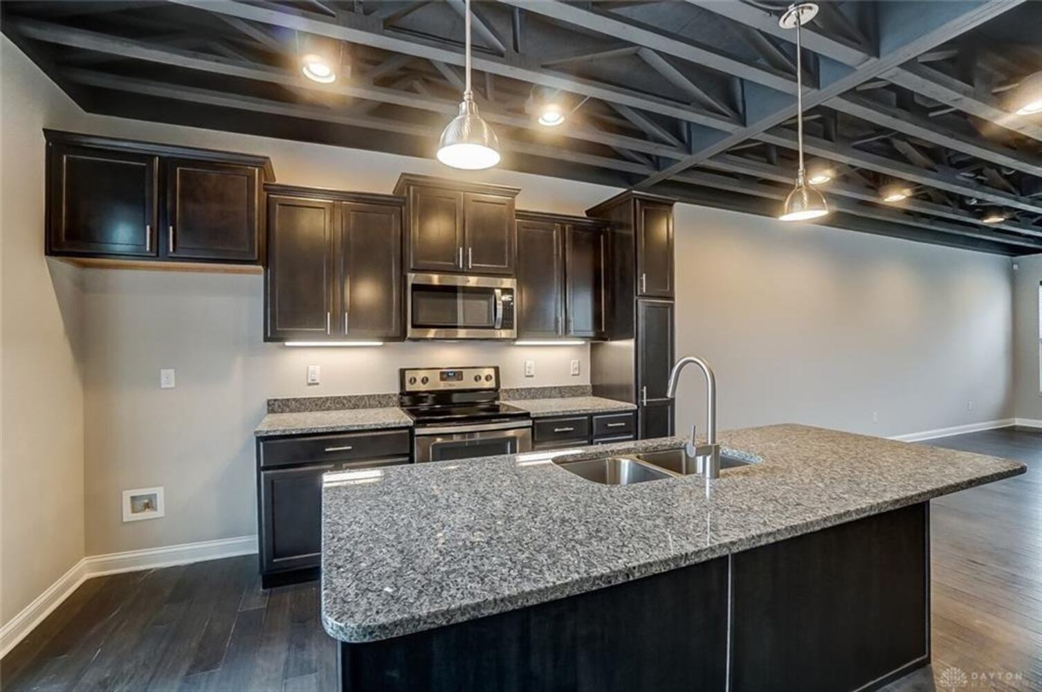 PHOTOS: Downtown Dayton condo with rooftop patio listed for nearly $500K