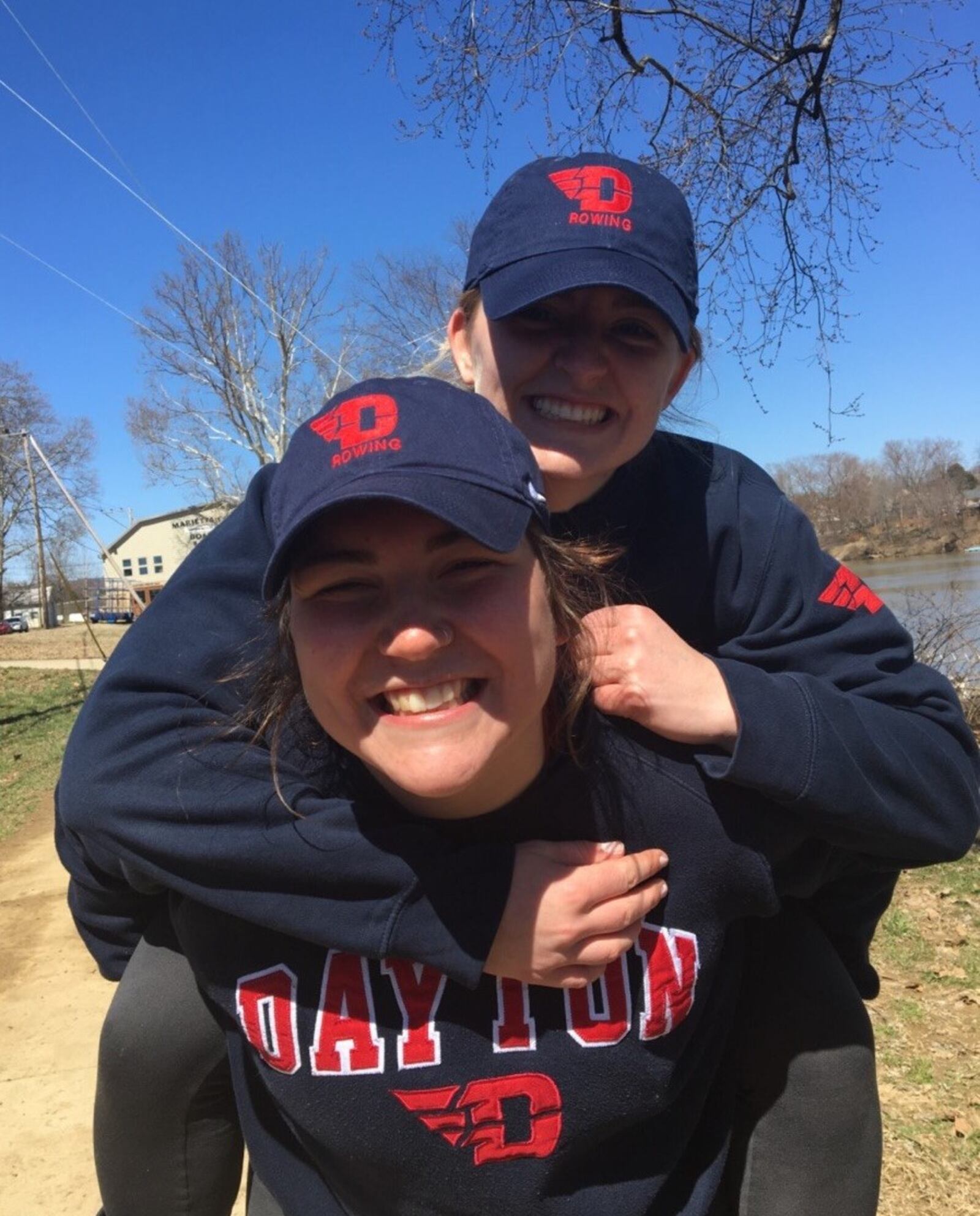 Emma Speyer with UD rowing teammate Colleen McDonnell taking piggy-back ride. CONTRIBUTED
