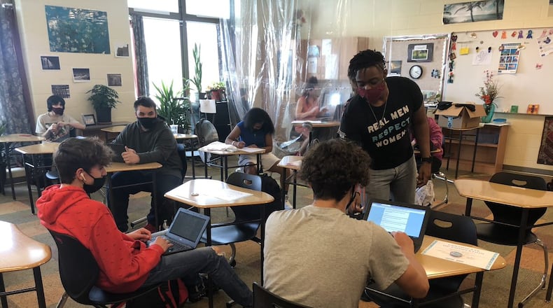 AMEND staff work with local boys during this past school year to learn about healthy masculinity and preventing violence against women and girls. CONTRIBUTED