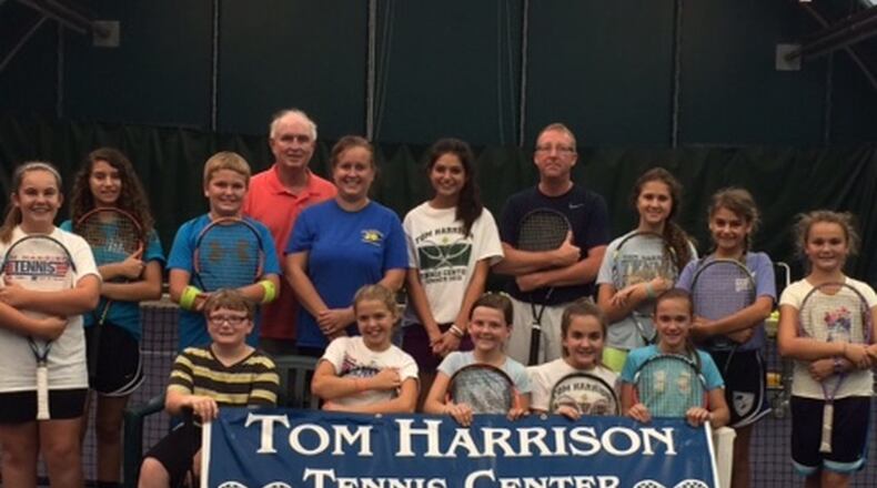 Tom Harrison and just a few of the more than 150 young players, who he weekly trains at his center in Springboro. CONTRIBUTED