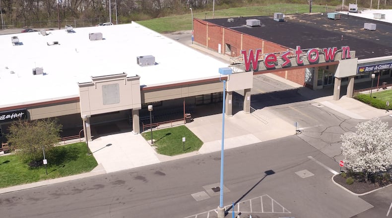 Former Aldi location in the Westown Shopping Center.  Ten years after the only Kroger on the west side of Dayton closed, beginning the onset of a food desert for people living here, the Aldi in the Westown Shopping Center closed its doors in April.     TY GREENLEES / STAFF