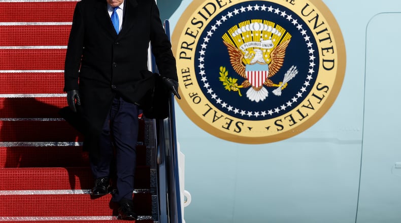 President Donald Trump walks down the stairs of Air Force One upon his arrival at Joint Base Andrews, Md., Monday, March 23, 2026. (AP Photo/Luis M. Alvarez)
