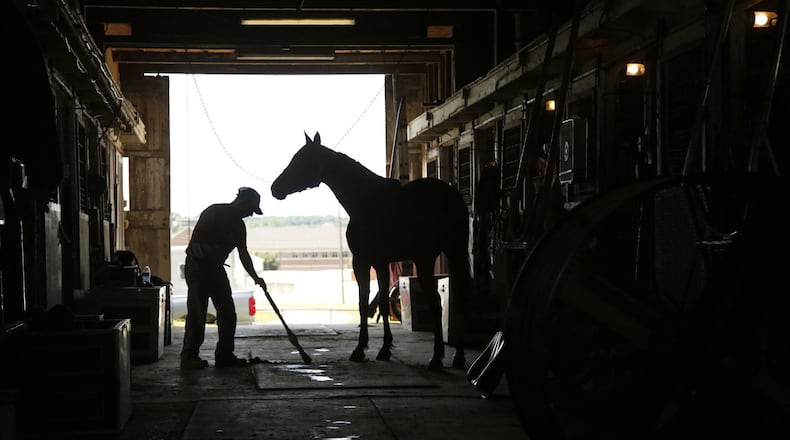For more than 150 years, horses have been raced at the Montgomery County Fairgrounds. Trotters that have been boarded and trained there will be gone by July 1, leaving many empty barns and stalls. TY GREENLEES / STAFF