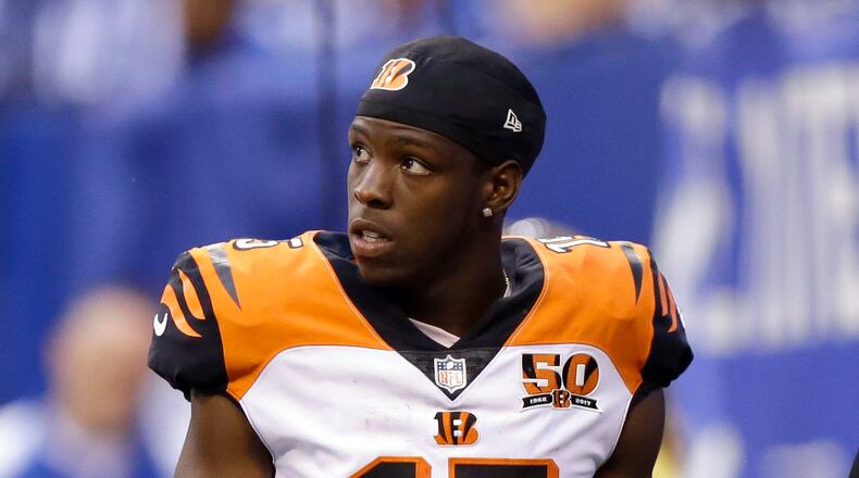 Cincinnati Bengals wide receiver John Ross leaves the field in the first half of a preseason NFL football game against the Indianapolis Colts in Indianapolis, Thursday, Aug. 31, 2017. (AP Photo/Michael Conroy)