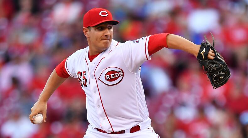 CINCINNATI, OH - AUGUST 9: Asher Wojciechowski #65 of the Cincinnati Reds pitches in the second inning against the San Diego Padres at Great American Ball Park on August 9, 2017 in Cincinnati, Ohio. (Photo by Jamie Sabau/Getty Images)