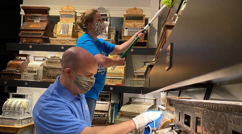 The cash register exhibit at Carillon Park gets a thorough cleaning before the museum reopens. CONTRIBUTED